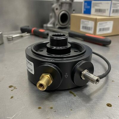 Universal oil filter sandwich plate adapter, installs between the engine block and oil filter. Features 2dedicated 1/8" NPT threaded ports for installing oil pressure gauges, temperature sensors